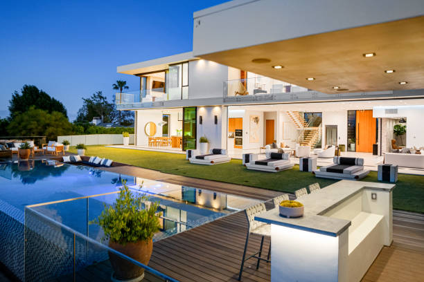 istock Contemporary house with evening patio and backyard view 2157067763