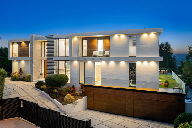 istock Modern white house illuminated at dusk 2157067767