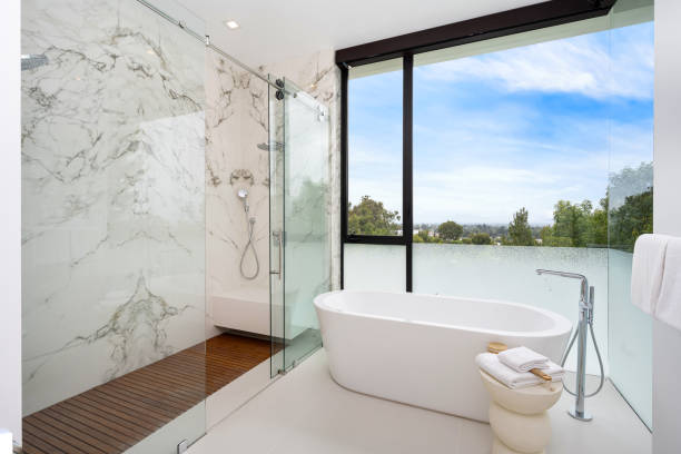 istock Luxurious bathroom with spacious tub, shower, and toilet 2157067801