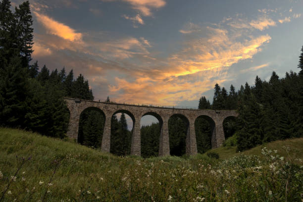 istock Chmarssky viaduct captured against a picturesque sunset backdrop 2157069115
