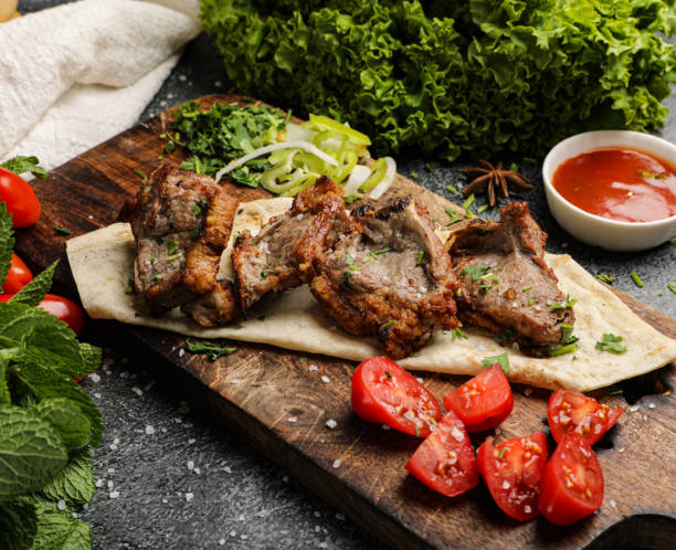 istock Fresh food on cutting board with tomatoes 2157069393