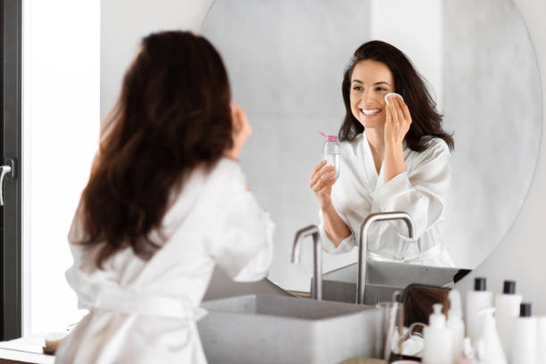 istock Woman using cotton pad on her face 2157073070