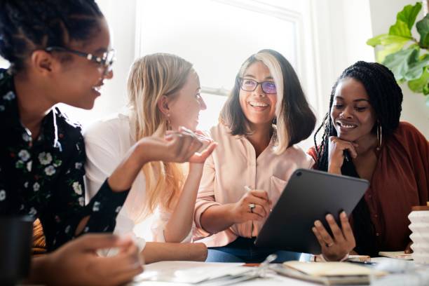 istock Fashion designers having a meeting using a digital tablet 2157074560