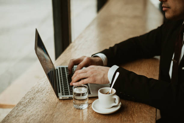 istock Businessman working in a cafe 2157074604