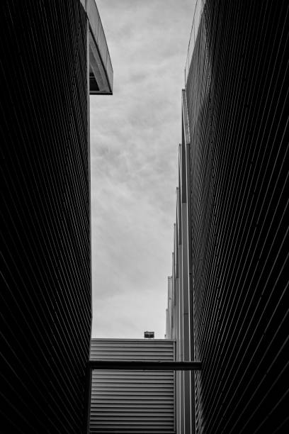 istock a dark narrow, brick building is shown in a dramatic picture 2157074660