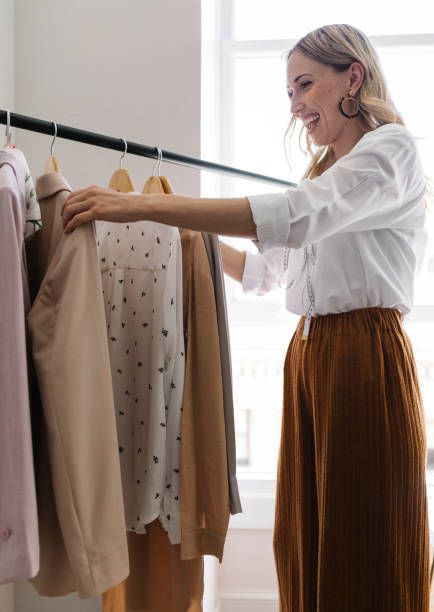 istock Young female designer in a boutique 2157074768