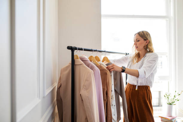 istock Young female designer in a boutique 2157074803