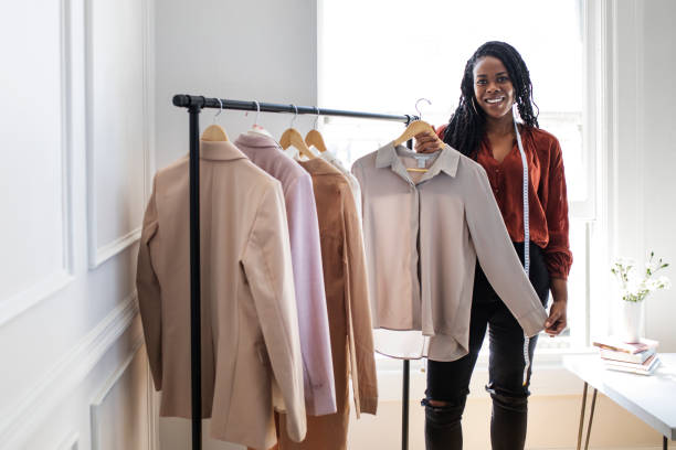 istock Young female designer in a boutique 2157074889