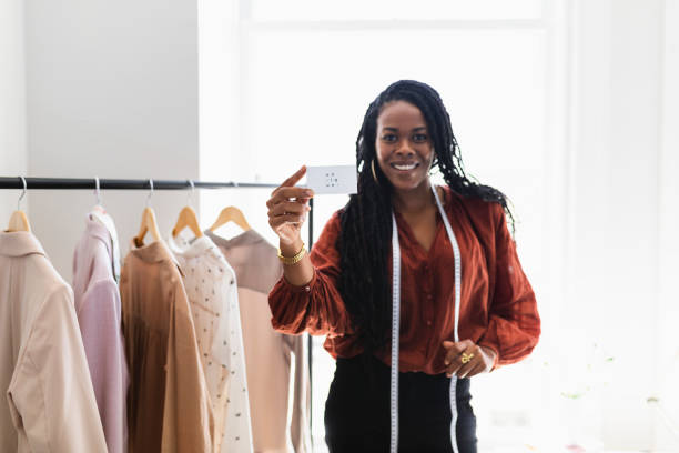 istock Young female designer in a boutique 2157074903