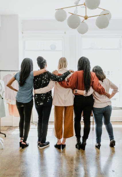 istock Diverse women standing facing the window 2157075096