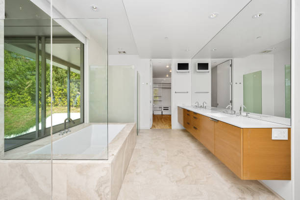 istock Spacious bathroom featuring a bathtub, vanity, and shower 2157075240