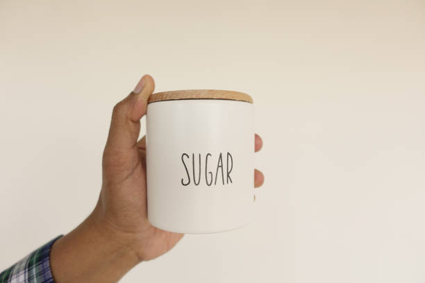 istock holding a A wicker basket sugar jars 2157075973