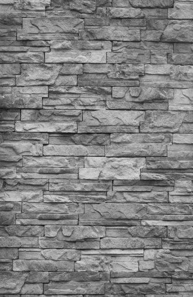 istock The walls are made of gray stone brick. See textures and patterns suitable for creating black and white wallpaper. 2157079921