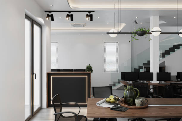 istock Modern office meeting zone with wooden table and cozy chairs 2157082708