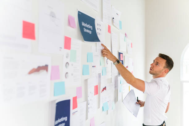 istock Businessman checking a marketing plan 2157083046