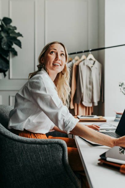 istock Young female designer in a boutique 2157083606