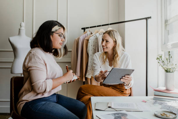 istock Young female designers in a boutique 2157083673