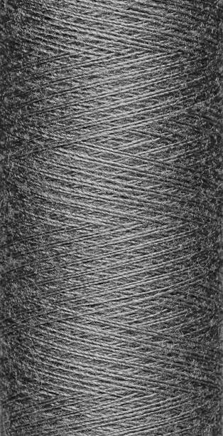 istock macro texture of a skein of grey sewing thread 2157084081