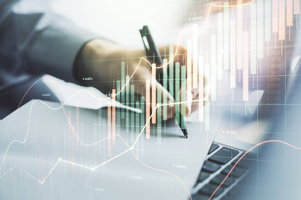 istock Abstract creative financial graph with hand writing in notebook on background, forex and investment concept. Multiexposure 2157087148