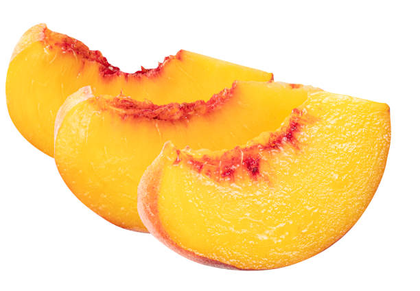 istock Ripe peach slices on white background. File contains clipping path. 2157087833