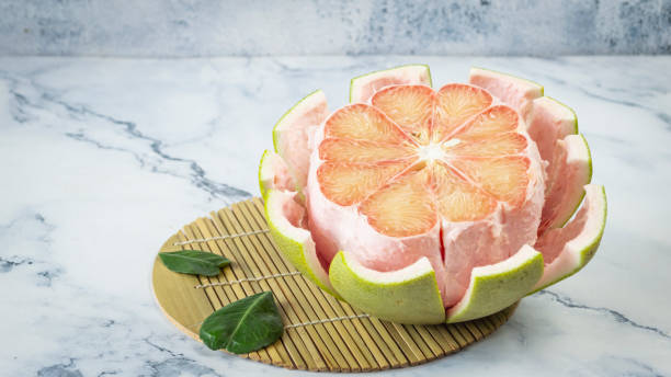 istock Ripe pomelo cut in half 2157088125