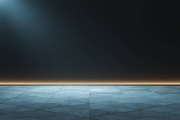 istock An empty modern interior with a tiled floor against a dark gradient background, embodying a minimalist design concept. 3D Rendering 2157088974