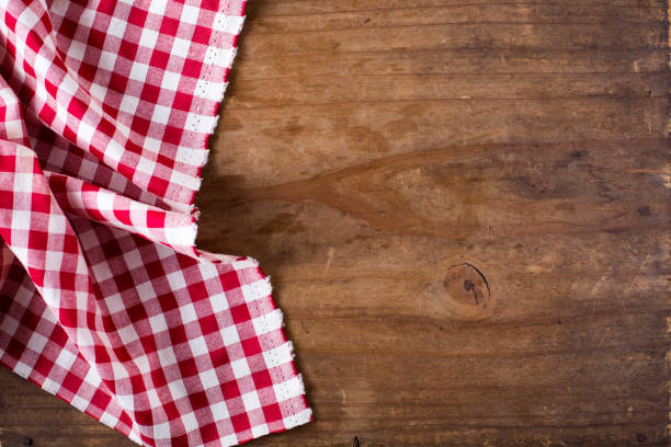 istock red tablecloth on wooden background 2157093300
