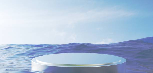 istock 3D Rendered Metallic product Platform. Layered silver round podium surrounded by water with sea and sky horizon background. Luxurious advertisement template. Perfect for aquatic items. 2157100768