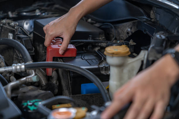 istock A woman checks the engine condition before setting off on a journey 2157100895