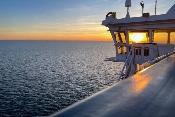 istock ship and sunset on the sea 2157101283