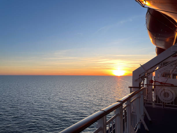 istock ship and sunset on the sea 2157101286