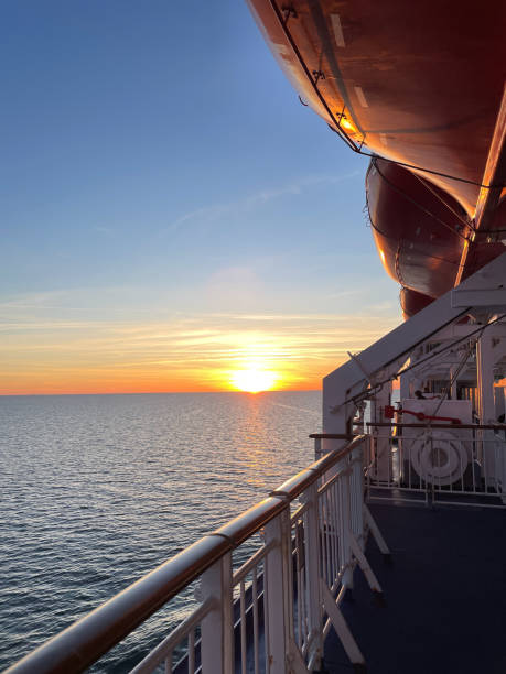 istock ship and sunset on the sea 2157101291