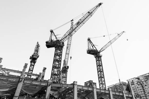istock View of cranes above steel structure for building construction in Taiwan. 2157102004