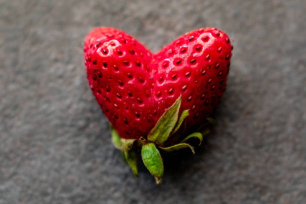 istock Funny heart shaped strawberry, fragaria, fragum 2157102897