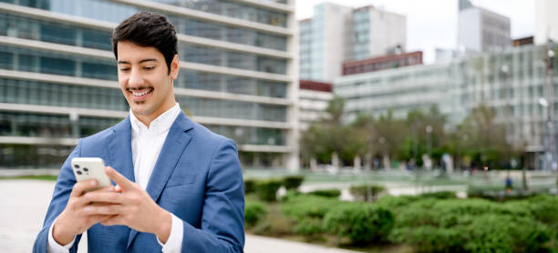 istock Confident Hispanic businessman in suit 2157103429