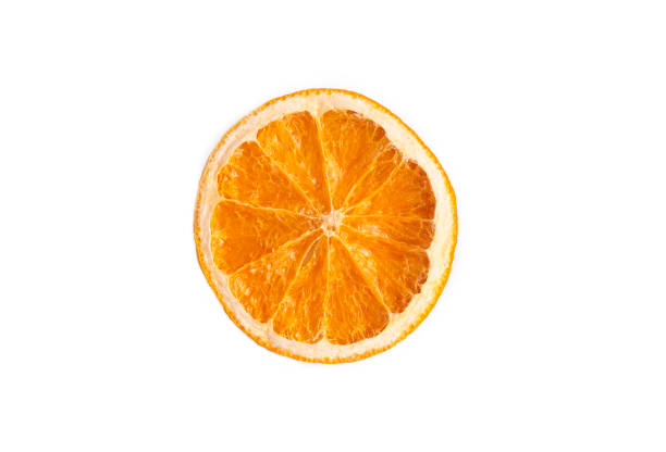 istock Delicious dry - dried orange slices on white background 2157106738