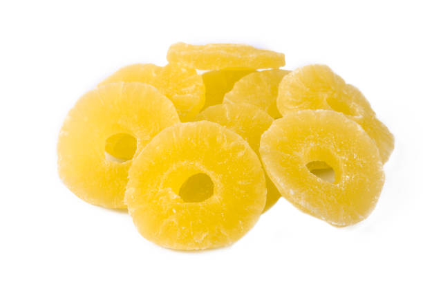 istock Slices of dried pineapple fruit on a white background. 2157107756