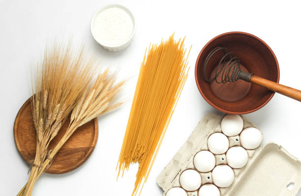 Ingredients for cooking homemade pasta on a white background. Top view. Flat lay