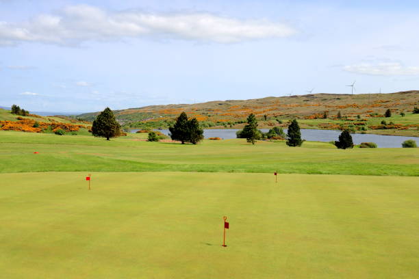istock Putting green at Greenock Golf Course with loch and hills in the background 2157113018