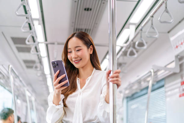 Wmata Using Phone 6,000+ Asian Smartphone Metro Stock Photos, Pictures & Royalty-Free ...
