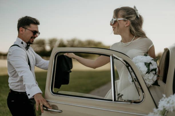 Beautiful vintage wedding car about to take a bride to get married