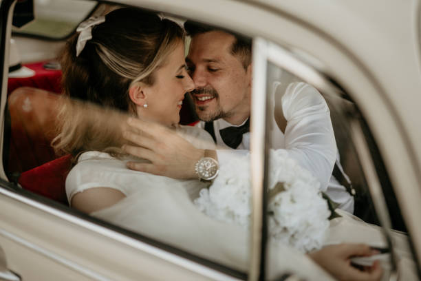 istock Pre-wedding shoot of a bride and groom  with old timer car 2157114333