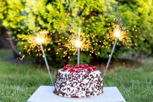 A close view of birthday cake with a candle on the table.