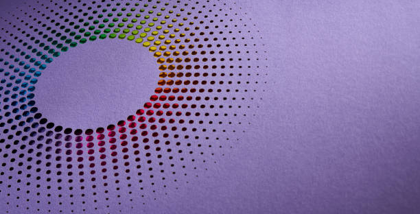 istock Colorful Perforated Paper Art in a Circular Gradient Pattern on a Purple Background 2157120297