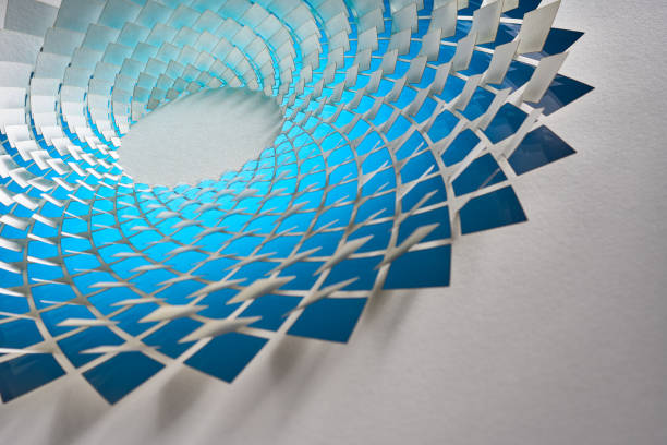 istock Intricate Paper Art with Blue Gradient Squares in a Spiral Formation on a Light Background 2157120528