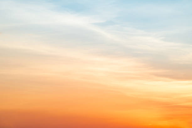 Beautiful , luxury soft gradient orange gold clouds and sunlight on the blue sky perfect for the background, take in everning,Twilight, Large size, high definition landscape photo