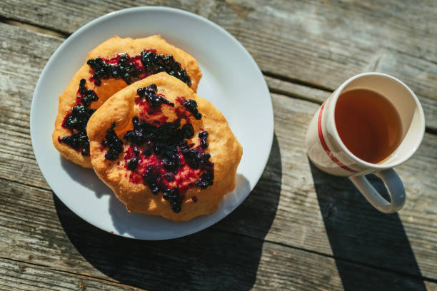 Traditional Bulgarian (Balkan) breakfast - Mekitzi (mekici) with jam