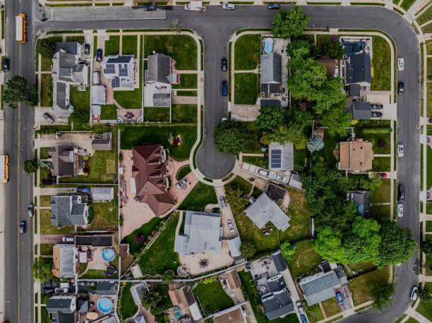 istock Top-down view over a middle-class residential neighborhood on a cloudy day. 2157123797