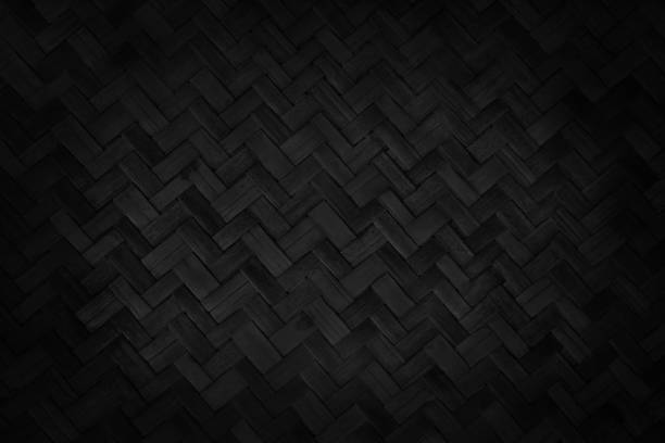 istock Old black bamboo weave texture background, pattern of woven rattan mat in vintage style. 2157126171