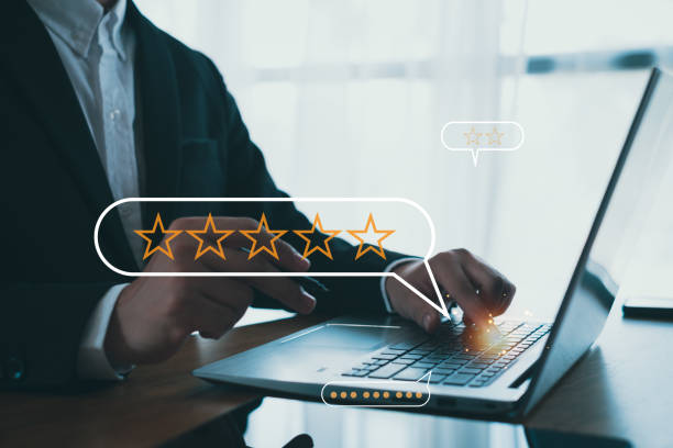 istock Customer service experience and business satisfaction survey, close up  hand using smart phone and give five star symbol to increase rating of product and service concept. 2157126605